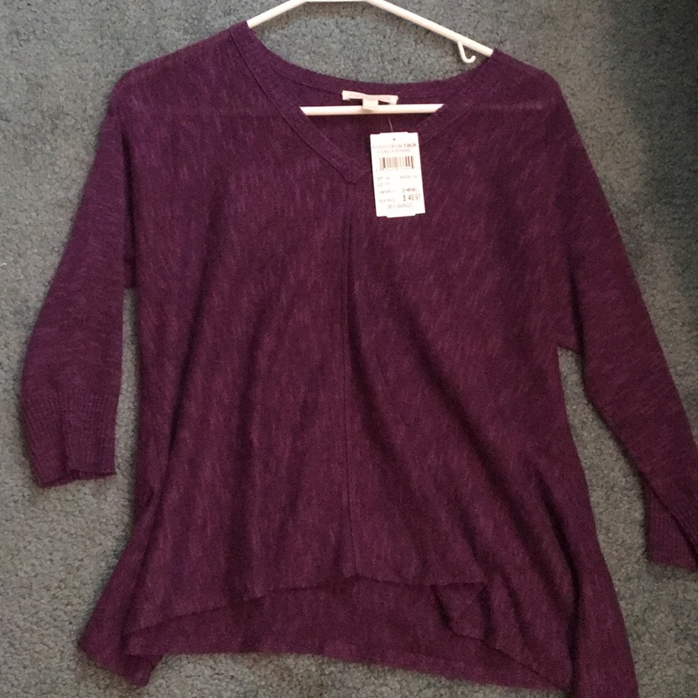 Heathered three quarter sleeved light sweater